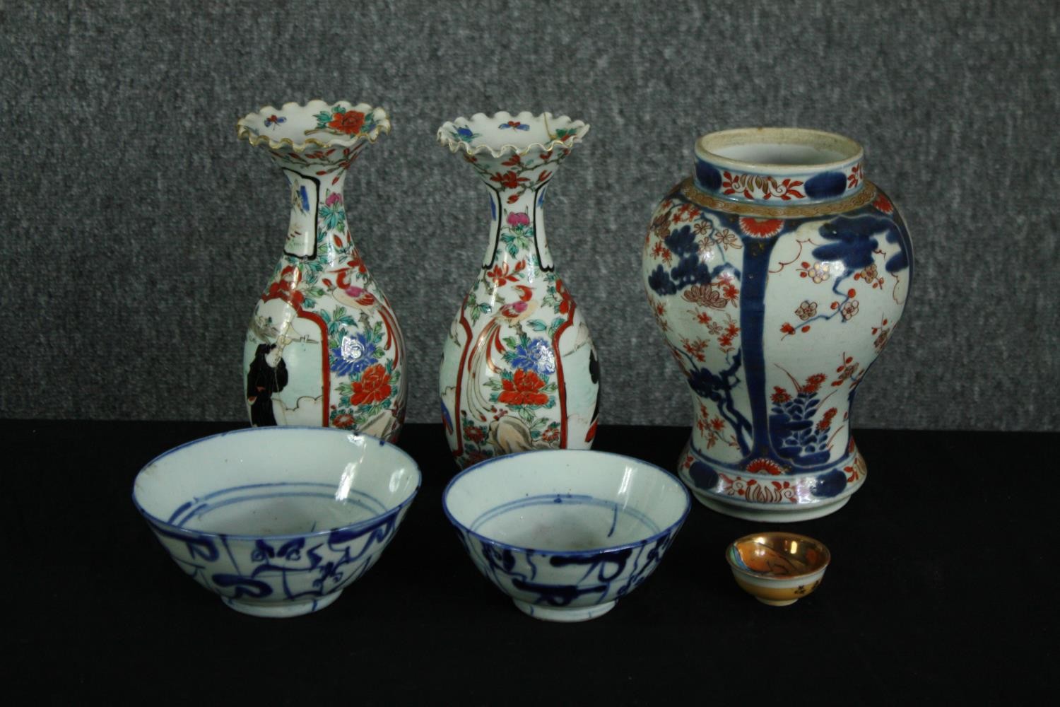 A collection of Japanese and Chinese ceramics, including a pair of gourd shaped hand painted vases