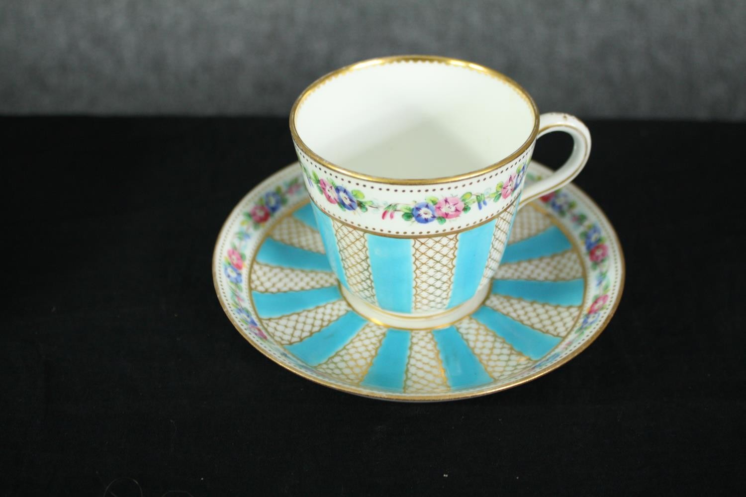 A collection of tea cups and saucers, including an orange and white early 20th century floral design - Image 9 of 19