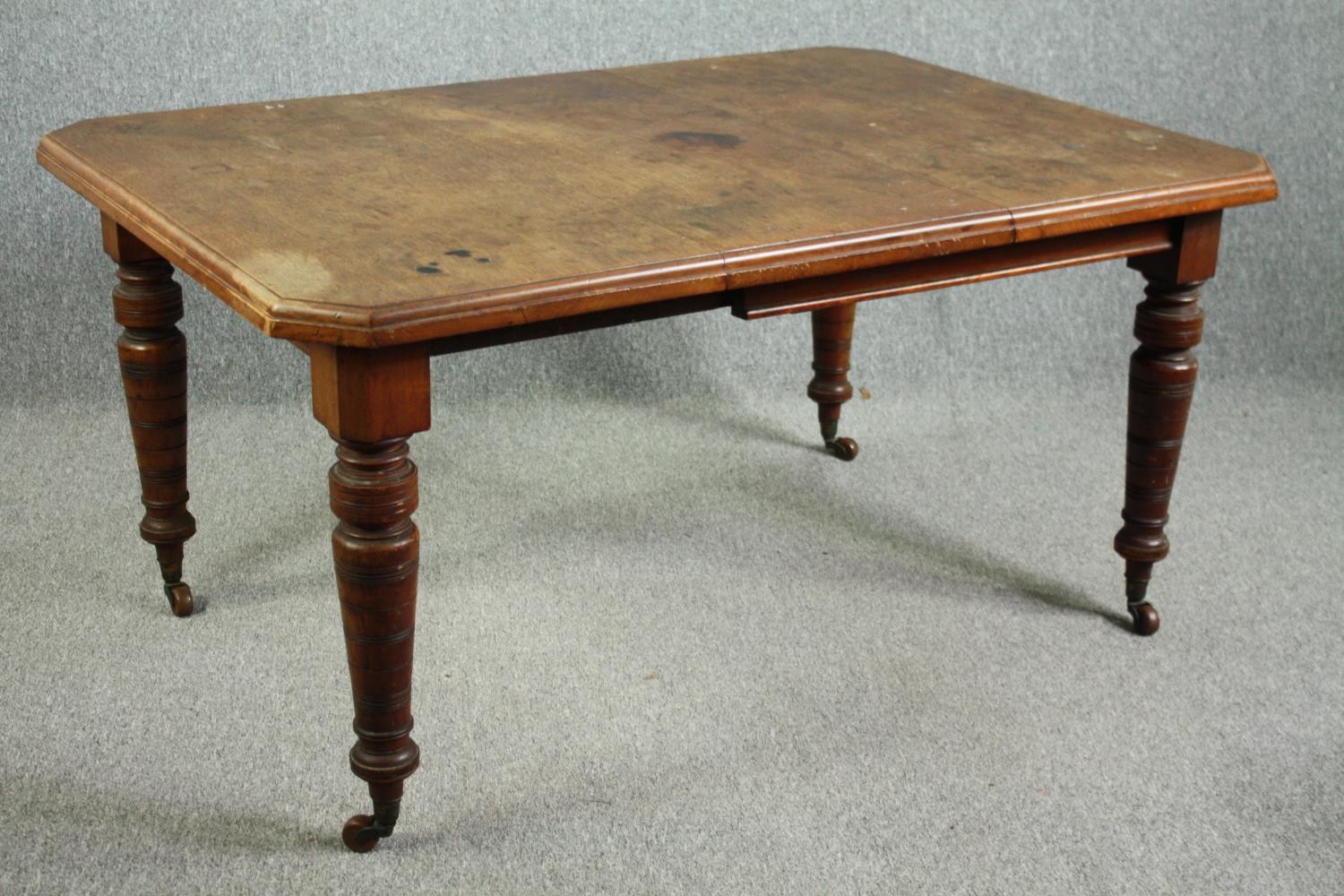 Dining table, Victorian walnut with fixed central leaf. H.74 W.148 D.104cm. - Image 2 of 4