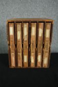A Victorian wooden cased set of six leather bound clutch files. (Empty) H.33 W.28 D.25cm.