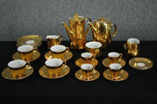 A vintage Royal Worcester gold lustre pattern tea set. Incomplete. Comprised of a teapot, coffee