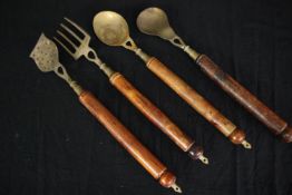 A set of vintage brass cooking utensils. L.47cm. (Largest).