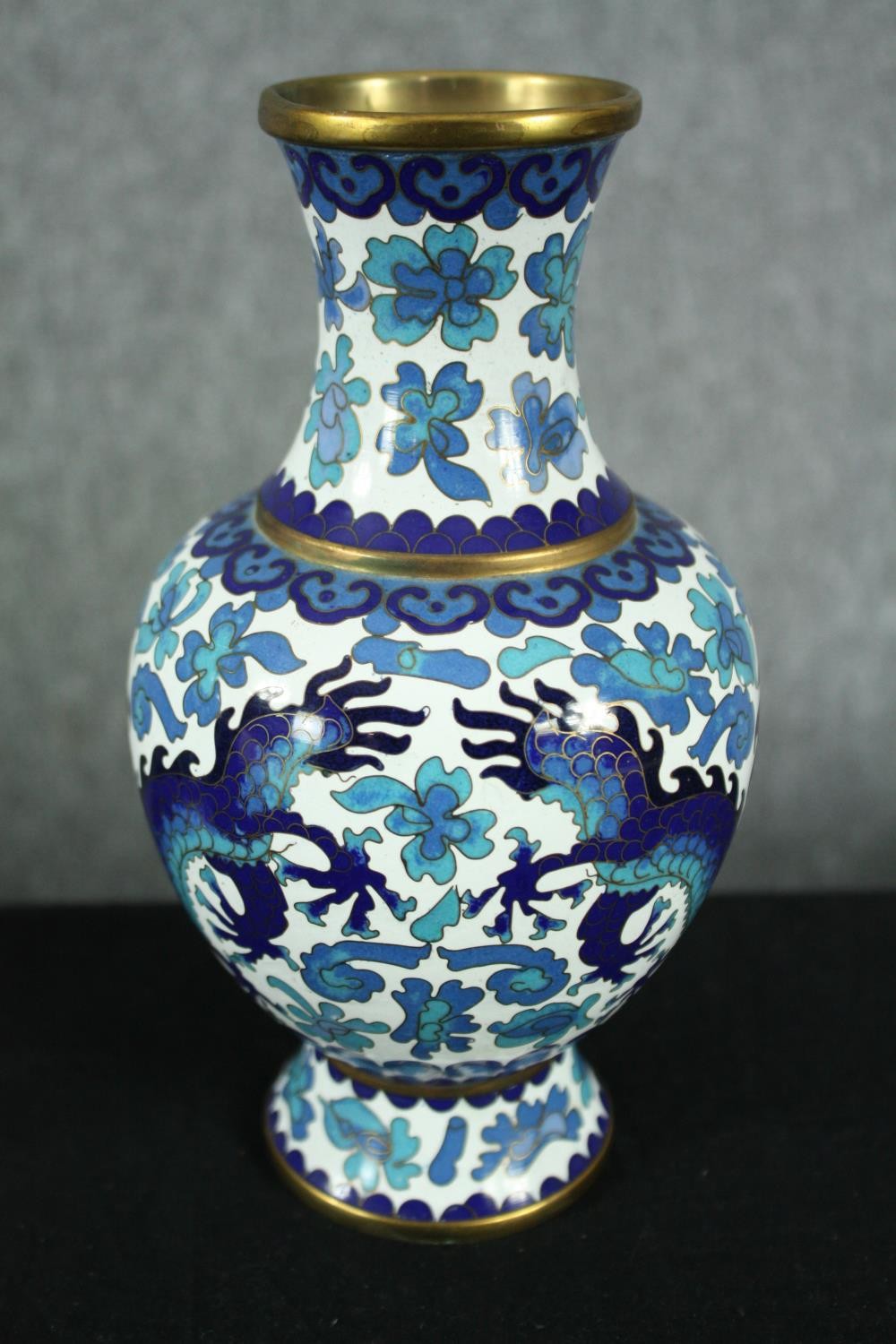 A pair of Japanese blue and white cloisonné enamel vases with dragon and floral motifs. H.21cm. ( - Image 2 of 4