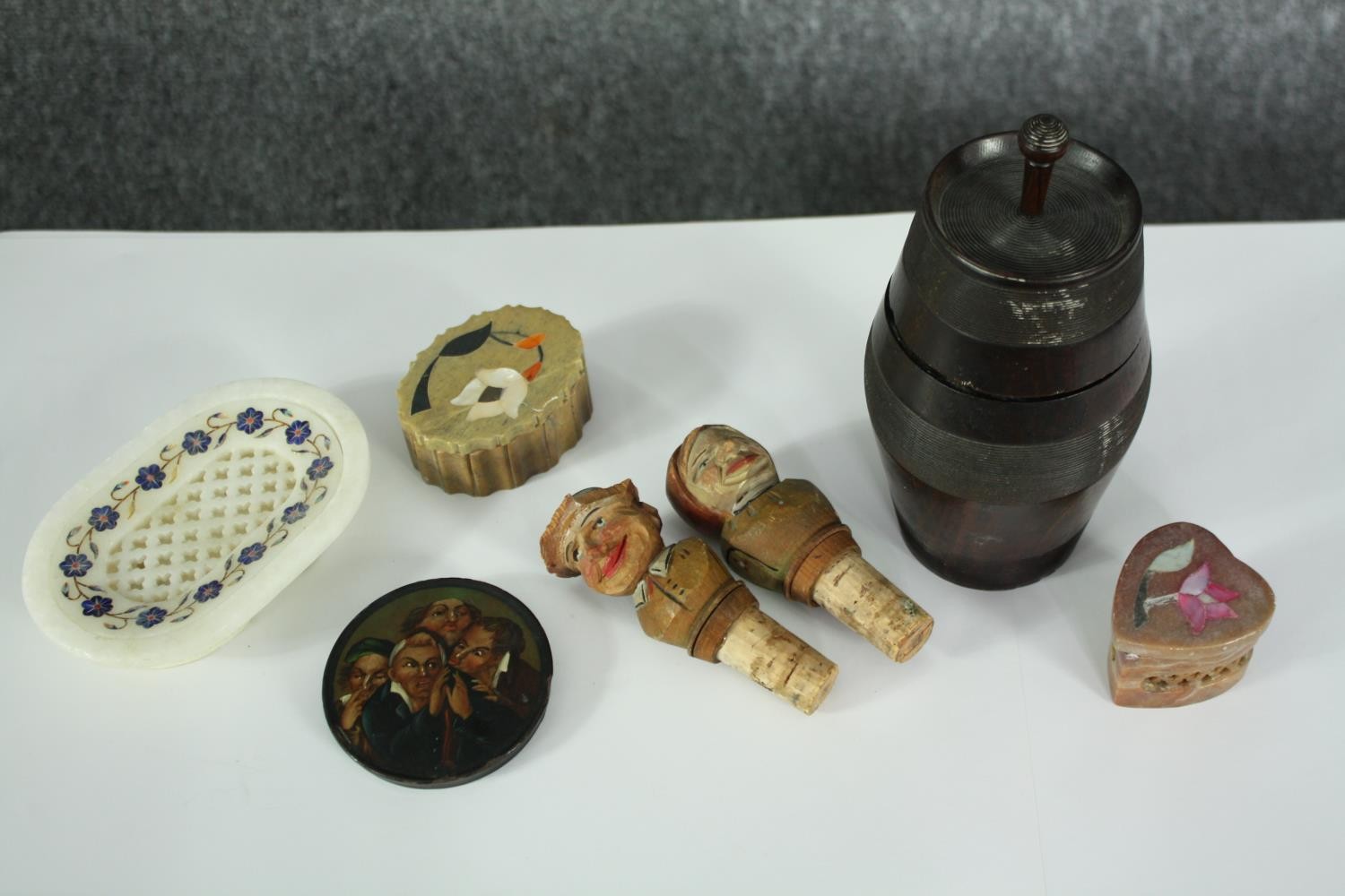 A collection of treen and pietra dura pieces, including a Georgian painted snuff box lid, a treen