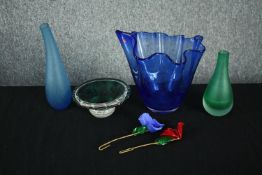 A collection of art glass, including two Mural glass petal flowers on silk stems, two bottle