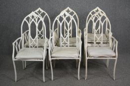 Garden or conservatory chairs, a set of six Gothic style with squab cushions. H.105cm. (Each).