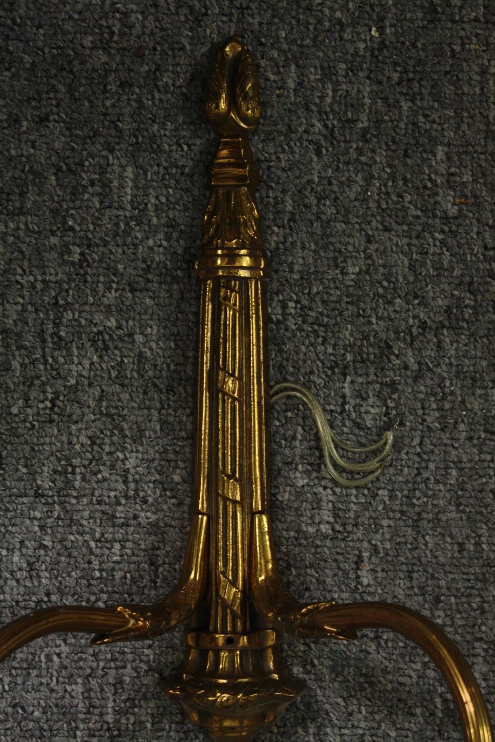 A pair of gilt metal Classical design brass twin branch wall sconces. H.66cm. (Each). - Image 6 of 8