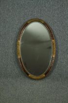 Wall mirror, C.1900 giltwood and gesso with faux tortoiseshell decoration. H.74 W.48cm.