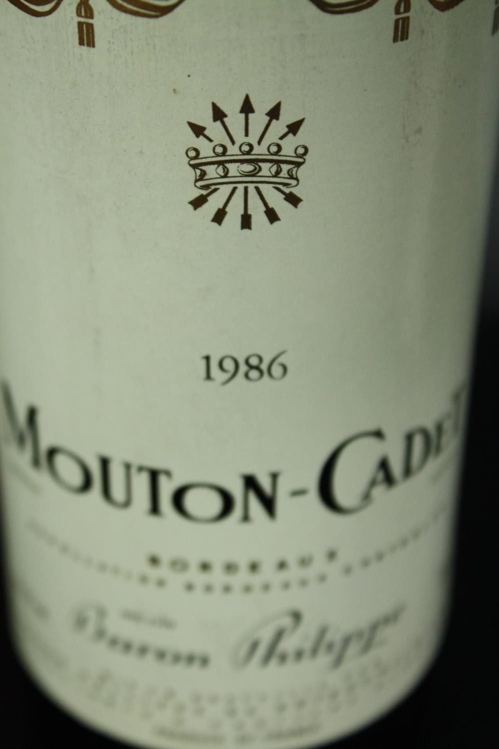 Eleven bottles of Mouton-Cadet Bordeaux. Ten are 1982 and one is 1986. H.30cm. (Each) - Image 4 of 5