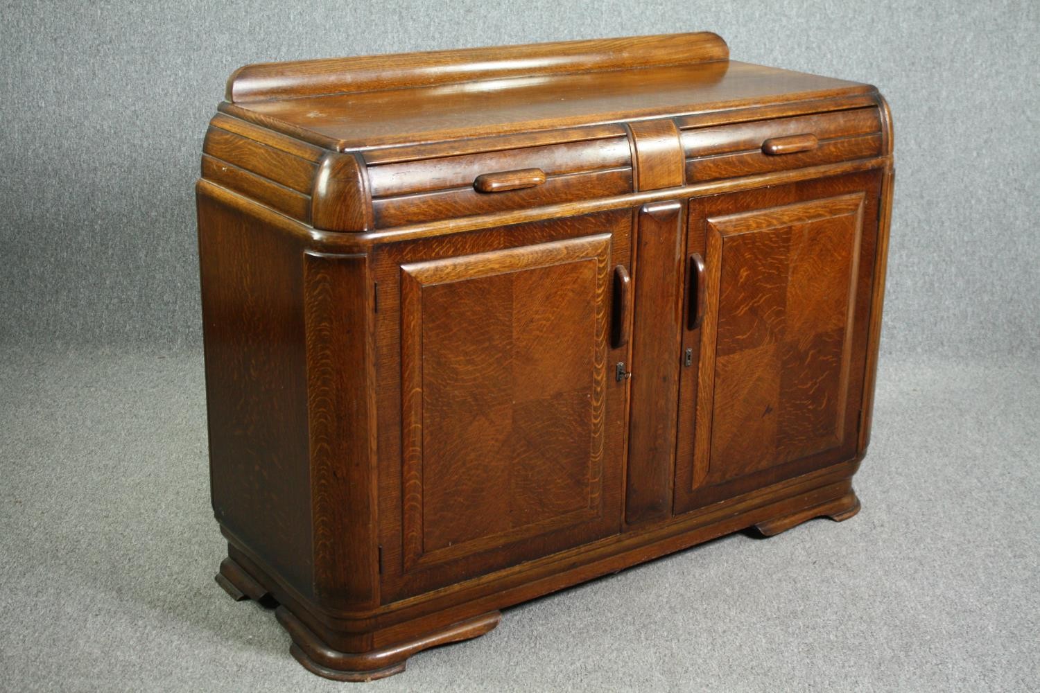 A mid century Art Deco style oak dwarf sideboard. H.103 W.137 D.52cm. - Image 2 of 7