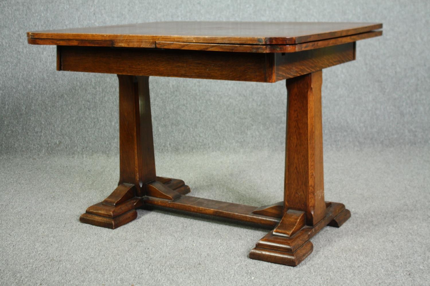 Dining table, mid century oak, draw leaf action. H.76 W.172. (ext) D.91cm. (In need of repair). - Image 4 of 9