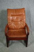 A mid century Mobel-Fiske leather upholstered armchair. H.93cm.