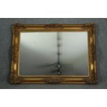 Wall mirror, contemporary gilt framed with bevelled plate. H.80 W.110cm.