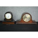 A 19th century ebonised and mahogany mantel clock along with a later clock. H.23 W.42cm. (largest)