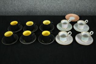 A four person gilded design Martinroda coffee set (one cup missing) along with a black and yellow