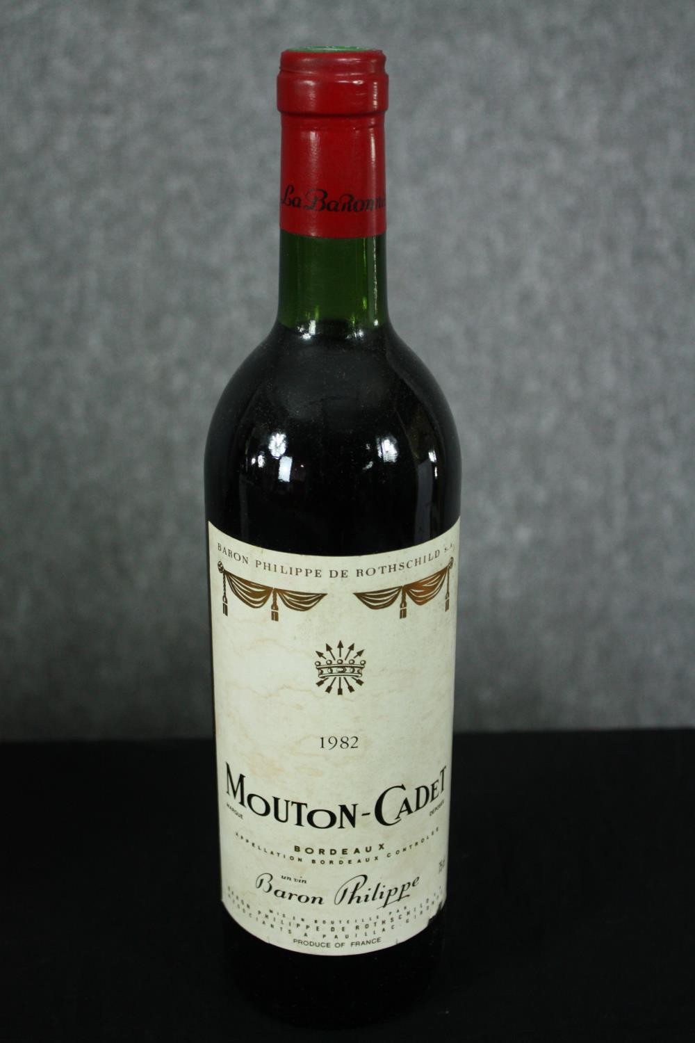 Eleven bottles of Mouton-Cadet Bordeaux. Ten are 1982 and one is 1986. H.30cm. (Each) - Image 2 of 5