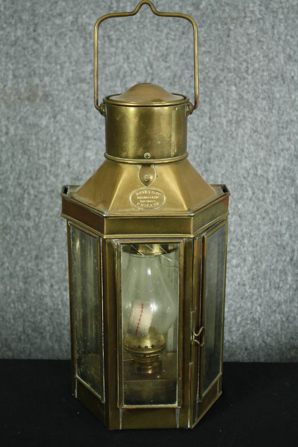 A brass Davey and Co oil lamp. H.52cm.
