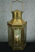 A brass Davey and Co oil lamp. H.52cm.