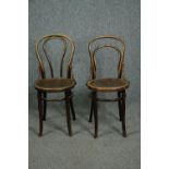 Two vintage bentwood cafe chairs.