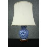 A vintage style table lamp with Chinese blue and white decoration. H.66cm.