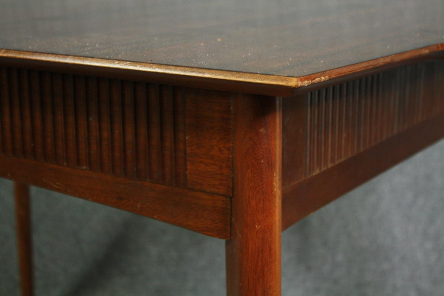 A mid century Waring and Gillow Ltd dining table. H.75 W.122 D.84cm. (The central leaf is missing - Image 5 of 7