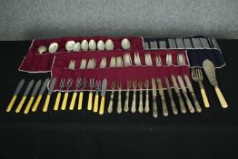 An extensive collection of mixed silver plate and bone handled cutlery. 30cm. (Largest)