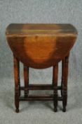 Occasional table, mid century oak with drop flap gateleg action. H.73 W.89 D.58cm.