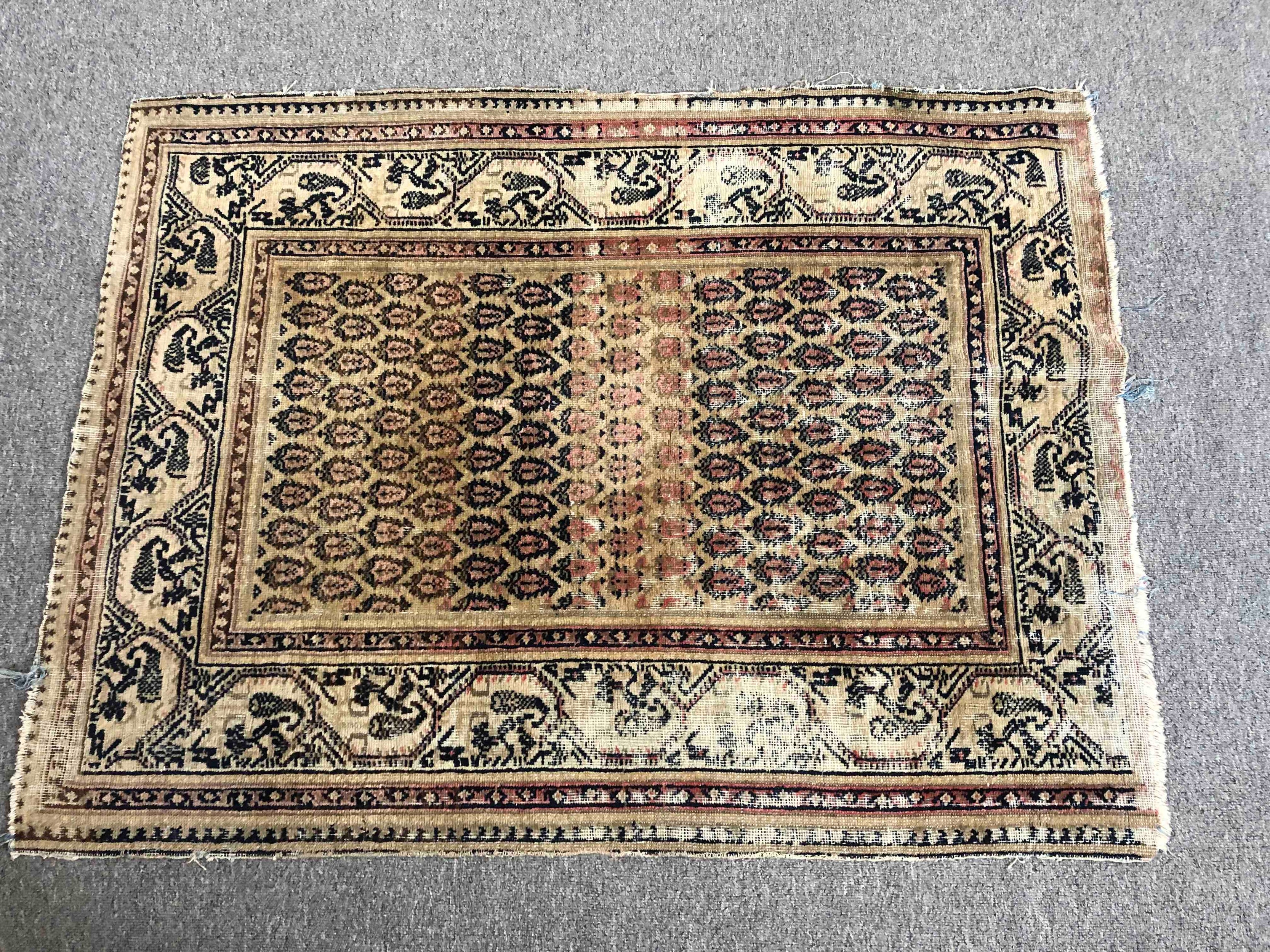 Rug, Kazak with repeating boteh motifs within multiple borders. L.140 W.105cm.