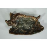 A bronze figure of a wild boar. L.16 W.10cm.