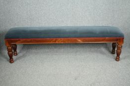 Window seat or hall bench, 19th century stained pine. H.53 W.182 D.36cm.