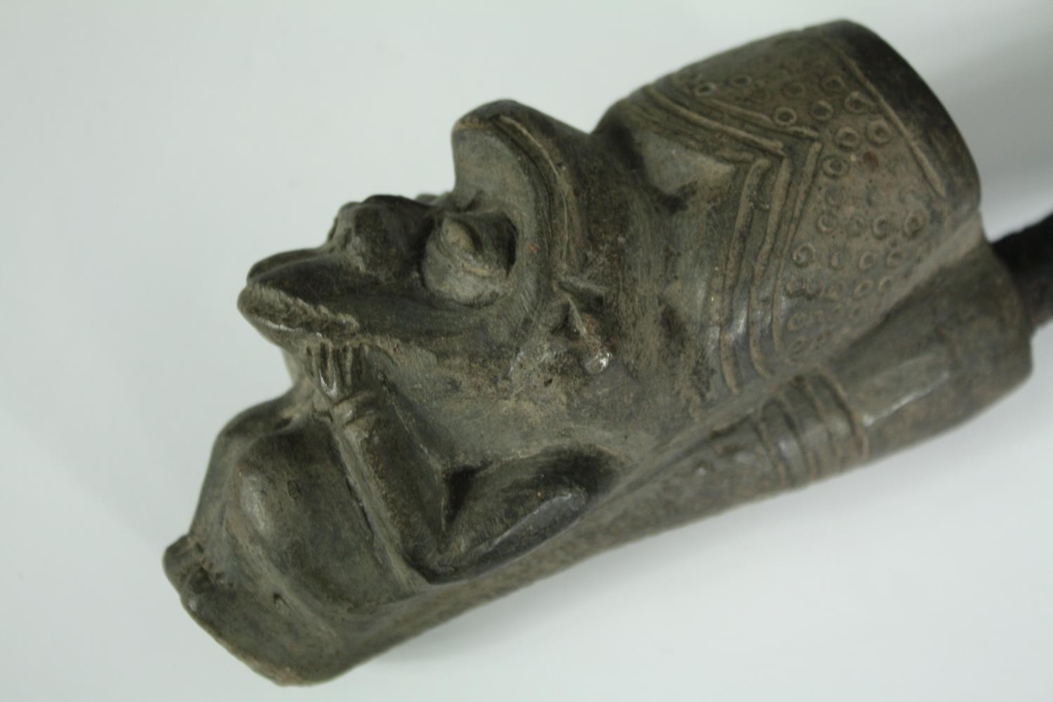 A Cameroon terracotta, metal and bone shaman's pipe along with a similar example. L.38cm. (Largest) - Image 6 of 6