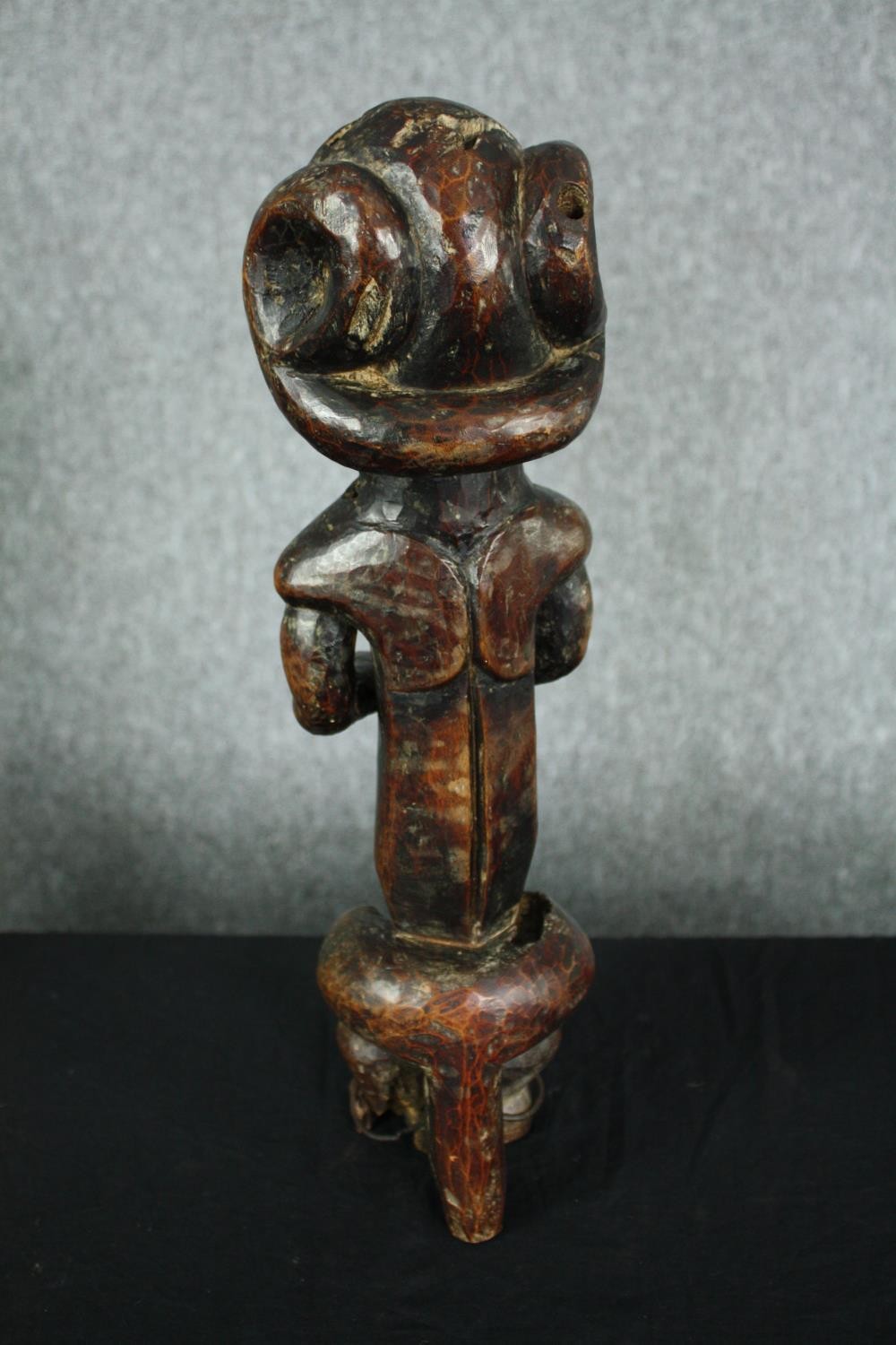 An African carved hardwood ancestor figure, possibly 19th century along with a similar example. H. - Image 9 of 11