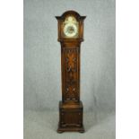 A mid to late 20th century grandmother clock in oak case. H.166cm.