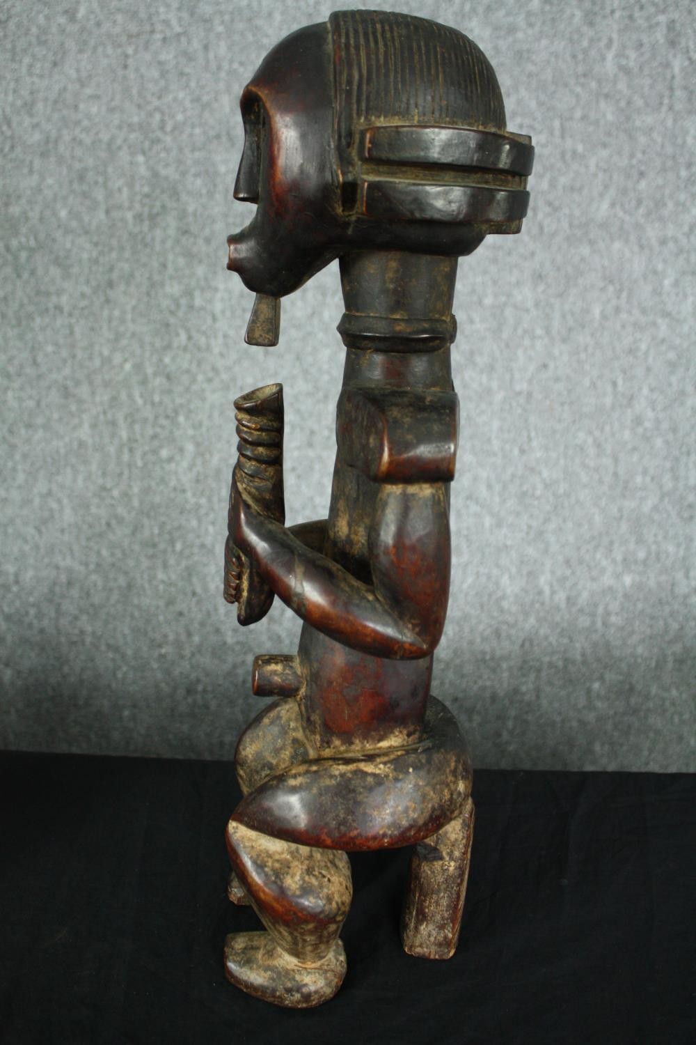 An African carved hardwood ancestor figure, possibly 19th century along with a similar example. H. - Image 3 of 11