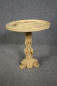 Occasional table, Eastern influenced moulded, in two parts. H.51 Dia.45cm. (Some damage as seen).