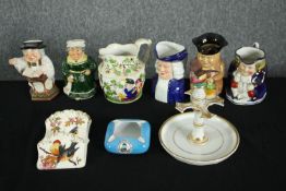 A collection of ceramics and porcelain, including five toby jugs, a Maersk, Far East service ash