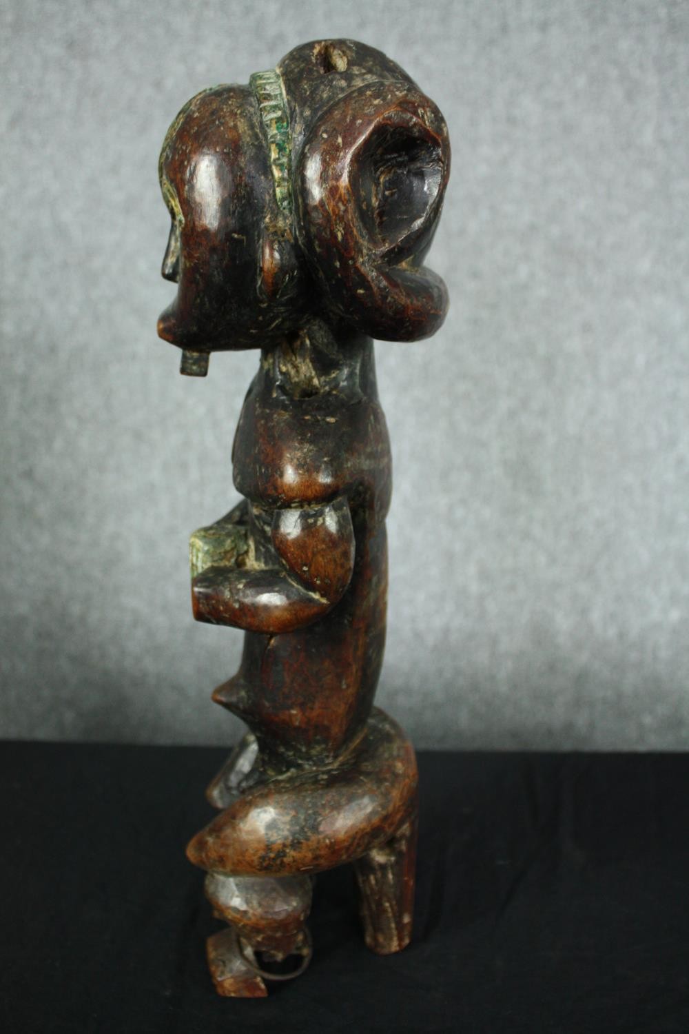 An African carved hardwood ancestor figure, possibly 19th century along with a similar example. H. - Image 8 of 11