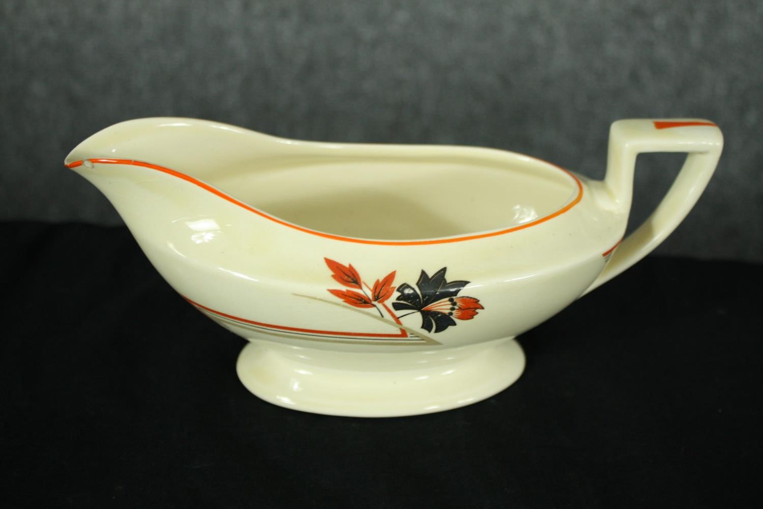 An Art Deco Crown Ducal dinner service. to include six dinner plates and large serving platters. L. - Image 8 of 11