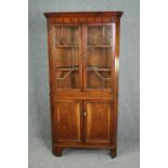 Corner cabinet, 19th century elm, floor standing in two sections. H.188 W.97 D.51cm.