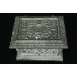 Dressing table box in a Classical design repousse metal alloy. H.13 W.18 D.14cm.