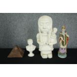 A collection of ceramic figures and a hieroglyphic decorated pyramid. Includes a figure of St.
