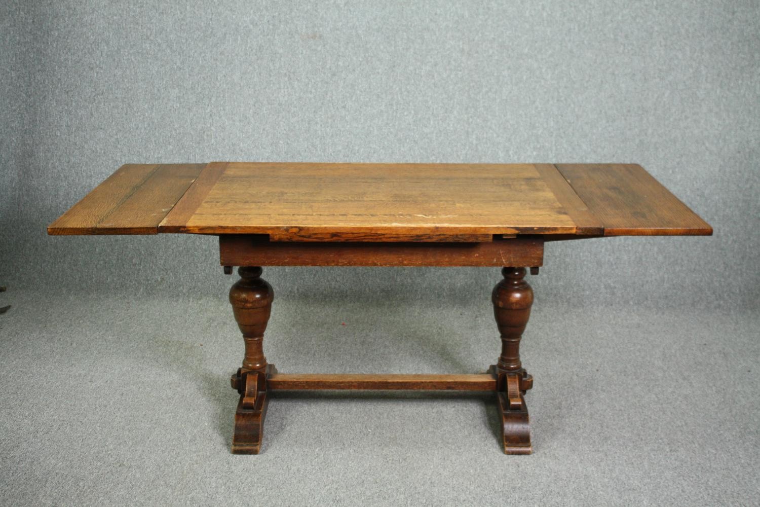 Dining table, mid century oak Jacobean style with draw leaf action. H.76 W.183 (ext) D.83cm. - Image 2 of 6