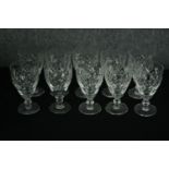 A set of ten cut crystal Thomas Webb wine glasses. H.12cm. (Each)