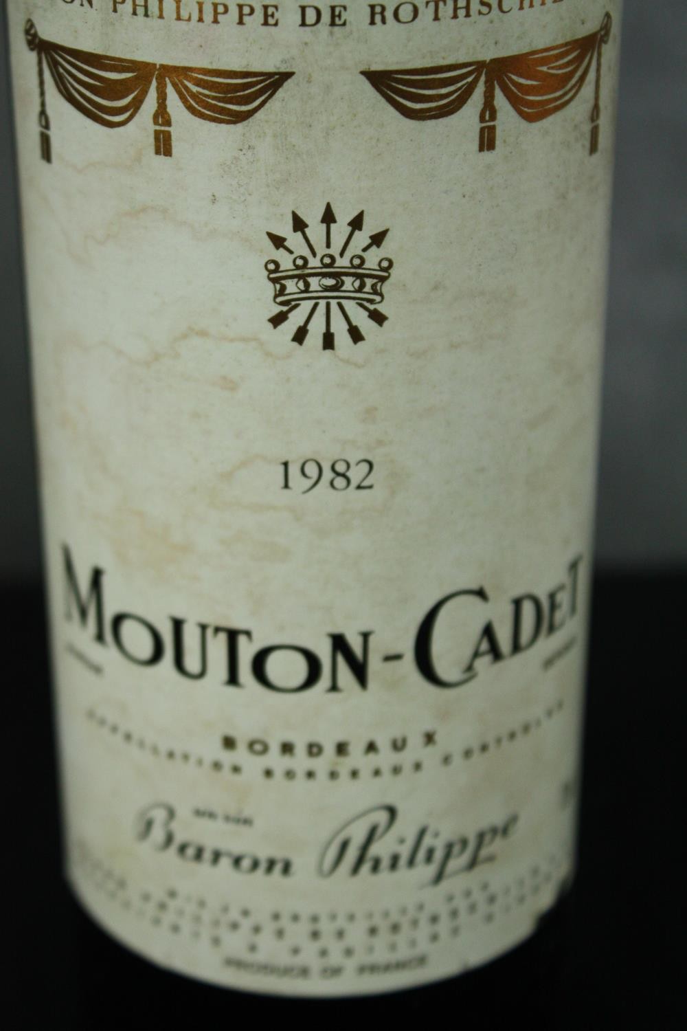 Eleven bottles of Mouton-Cadet Bordeaux. Ten are 1982 and one is 1986. H.30cm. (Each) - Image 3 of 5