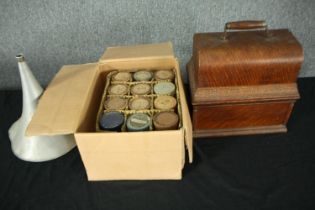 Phonograph, "Graphophone" with retail label for The Talking Machine Agency, with a box of cylinders.