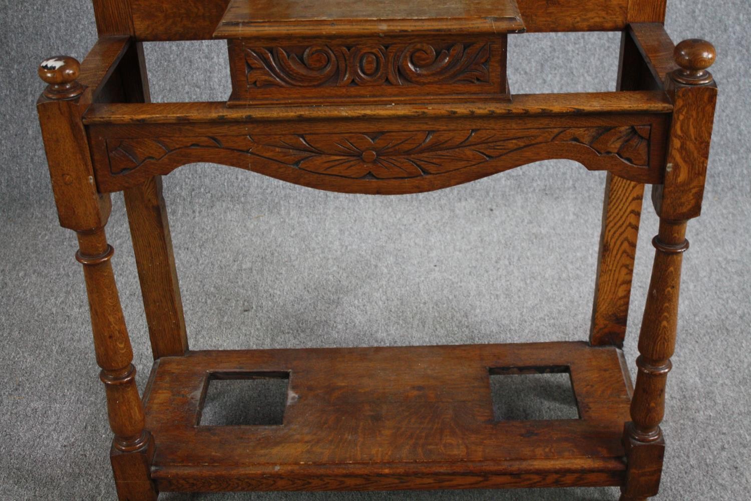 A Victorian period oak hall hat /coat and cane stand, dating from around 1890. With a shaped cornice - Image 6 of 6
