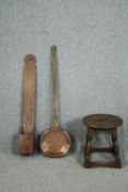 An antique oak stool on stretchered supports along with a 19th century candle box and a bed