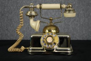 A reproduction vintage telephone (Wired for use). H.21cm.