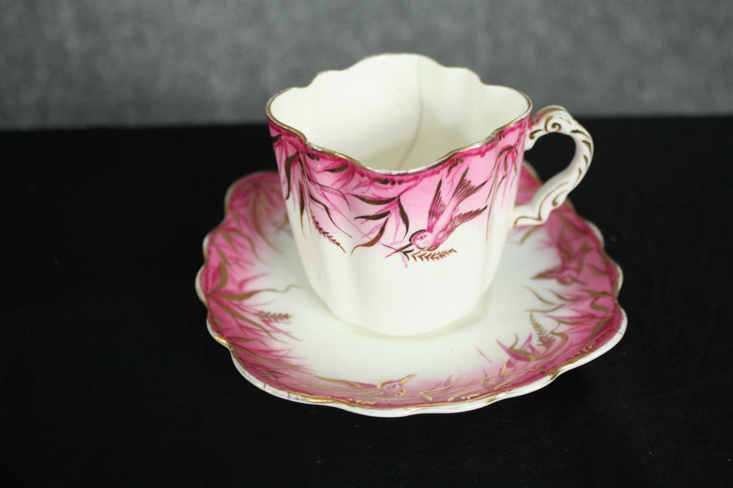 A 19th century hand painted 12 person part tea set with pink and gold foliate and hummingbird - Image 5 of 6