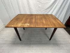 Dining table, possibly Gordon Rusell, mid century teak fitted with integral extension leaf. H.76 W.